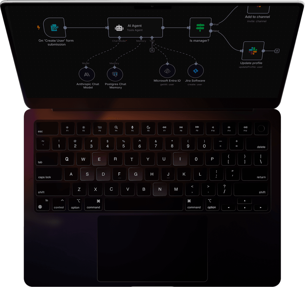 MacBook showing workflow automation interface